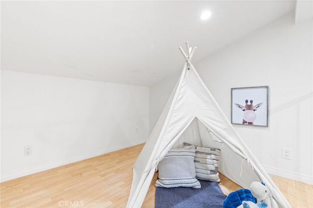 3012 W Oceanfront, Newport Beach, CA 92663 - playroom with wood finished floors, baseboards, and recessed lighting