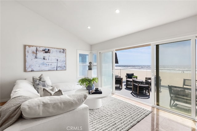 3012 W Oceanfront, Newport Beach, CA 92663 - living area with vaulted ceiling, recessed lighting, tile patterned floors, and a water view