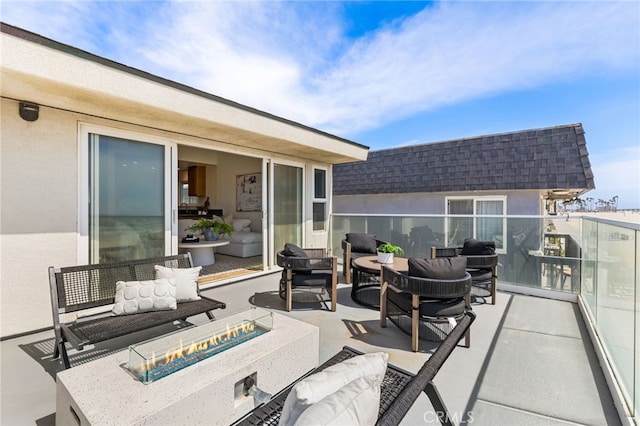 3012 W Oceanfront, Newport Beach, CA 92663 - view of patio featuring an outdoor living space with a fire pit