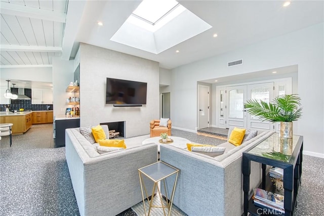 76010 Fairway Dr, Indian Wells, CA 92210 - living room featuring visible vents, baseboards, recessed lighting, and lofted ceiling with skylight