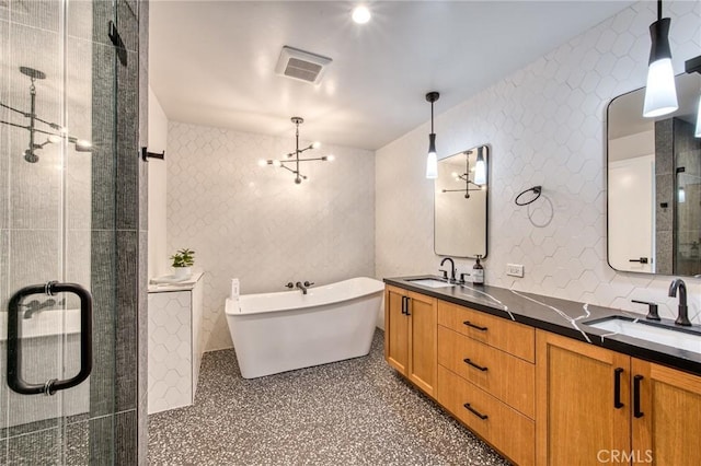 76010 Fairway Dr, Indian Wells, CA 92210 - bathroom with visible vents, a sink, and a stall shower