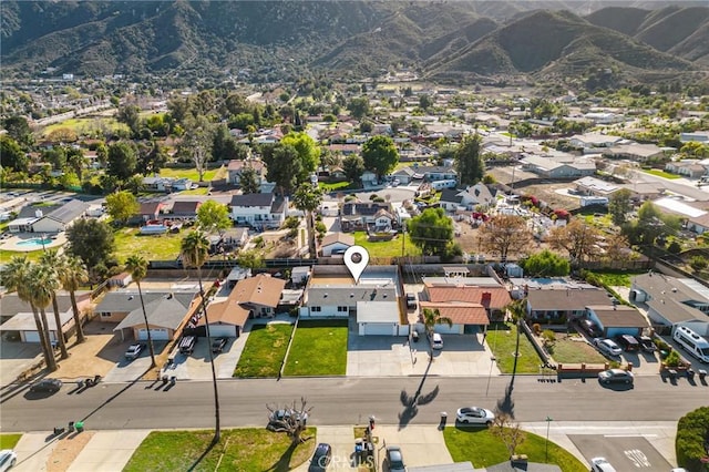 bird's eye view featuring a residential view and a mountain view