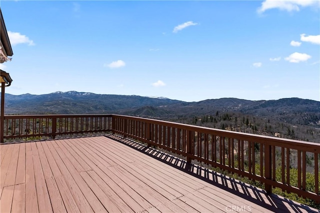 29083 Mammoth Dr, Lake Arrowhead, CA 92352 - wooden deck featuring a mountain view