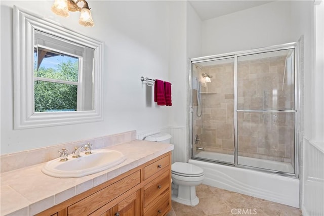 29083 Mammoth Dr, Lake Arrowhead, CA 92352 - full bath with vanity, combined bath / shower with glass door, and tile patterned flooring
