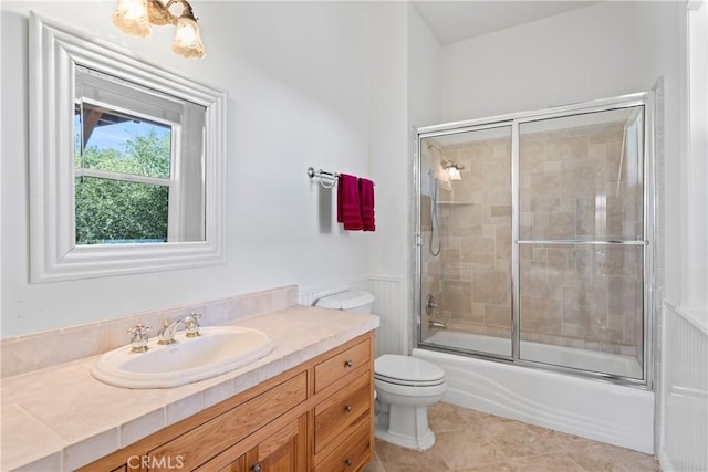 29083 Mammoth Dr, Lake Arrowhead, CA 92352 - full bathroom with vanity, bath / shower combo with glass door, and tile patterned floors