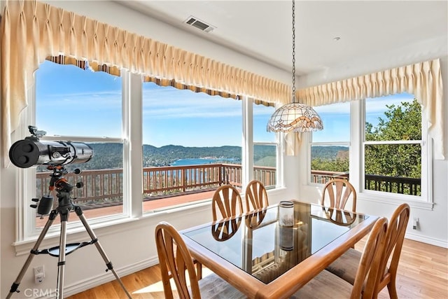 29083 Mammoth Dr, Lake Arrowhead, CA 92352 - dining room with wood finished floors and plenty of natural light
