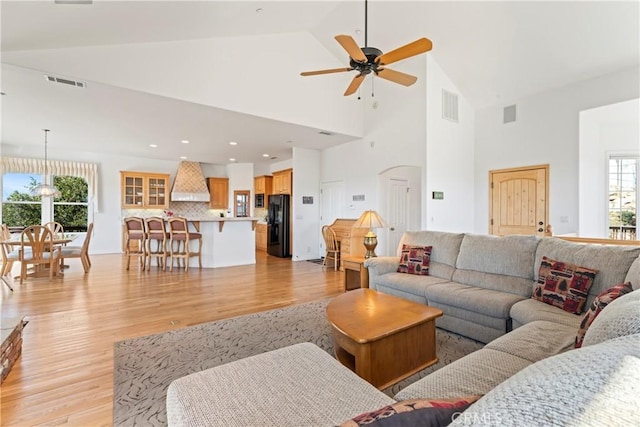 29083 Mammoth Dr, Lake Arrowhead, CA 92352 - living room with light wood finished floors, a ceiling fan, high vaulted ceiling, and recessed lighting