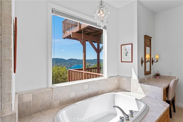 29083 Mammoth Dr, Lake Arrowhead, CA 92352 - bathroom with a chandelier, a garden tub, and a mountain view