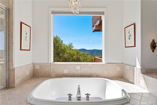 29083 Mammoth Dr, Lake Arrowhead, CA 92352 - bathroom with a bath, a mountain view, and tiled shower