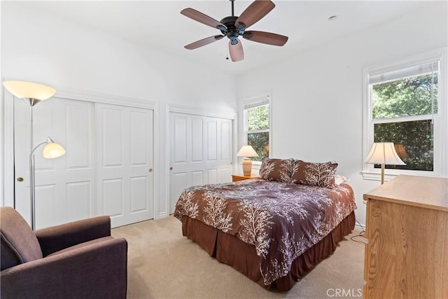 29083 Mammoth Dr, Lake Arrowhead, CA 92352 - bedroom with multiple closets and light carpet