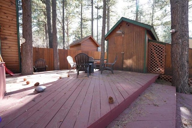 206 Cedar Ln, Sugarloaf, CA 92386 - wooden terrace featuring an outbuilding and fence