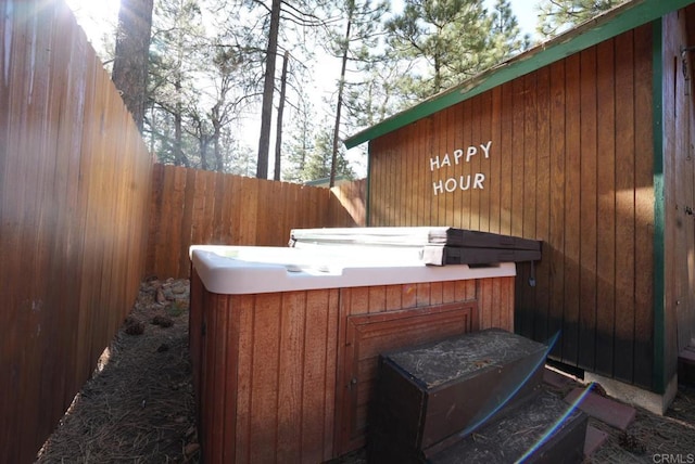 206 Cedar Ln, Sugarloaf, CA 92386 - exterior space featuring fence and a hot tub