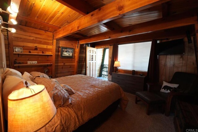 206 Cedar Ln, Sugarloaf, CA 92386 - carpeted bedroom with wooden walls, wood ceiling, and beamed ceiling