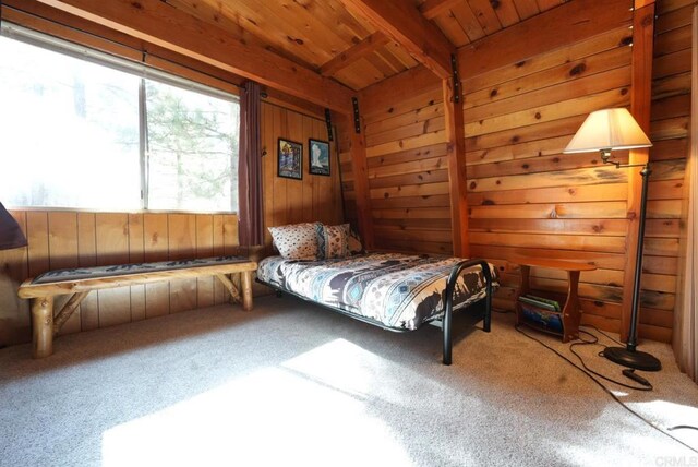 206 Cedar Ln, Sugarloaf, CA 92386 - carpeted bedroom with wood walls, wood ceiling, and beamed ceiling