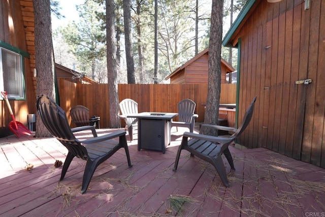 206 Cedar Ln, Sugarloaf, CA 92386 - wooden deck featuring fence and a fire pit
