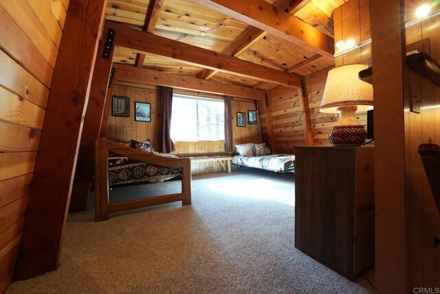 206 Cedar Ln, Sugarloaf, CA 92386 - carpeted bedroom with wood walls, wooden ceiling, and lofted ceiling with beams