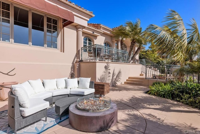 7189 Aviara Dr, Carlsbad, CA 92011 - view of patio / terrace with stairway and an outdoor living space with a fire pit