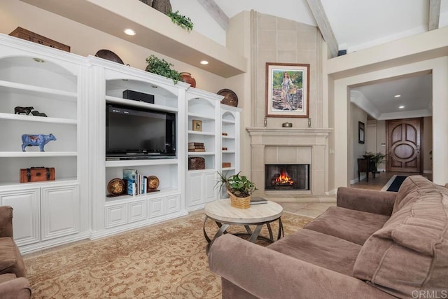 7189 Aviara Dr, Carlsbad, CA 92011 - living area featuring built in shelves, a premium fireplace, a towering ceiling, and recessed lighting
