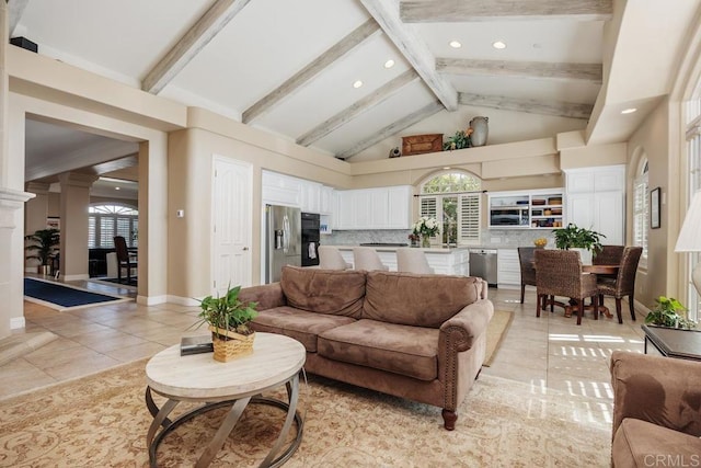 7189 Aviara Dr, Carlsbad, CA 92011 - living room featuring recessed lighting, light tile patterned floors, high vaulted ceiling, beamed ceiling, and decorative columns