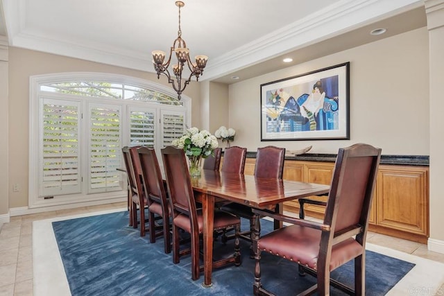 7189 Aviara Dr, Carlsbad, CA 92011 - dining space with light tile patterned flooring, a chandelier, ornamental molding, recessed lighting, and baseboards