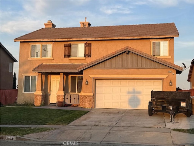 9153 Ravenswood Ave, Hesperia, CA 92344 - traditional-style home featuring a garage, stucco siding, a front lawn, a chimney, and driveway