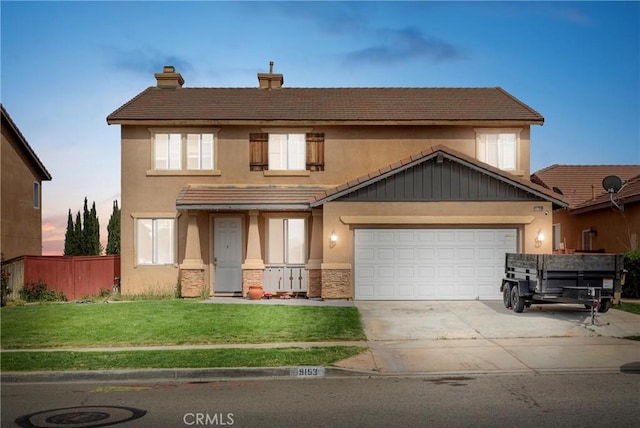 9153 Ravenswood Ave, Hesperia, CA 92344 - traditional home with a front yard, a chimney, fence, stucco siding, and driveway
