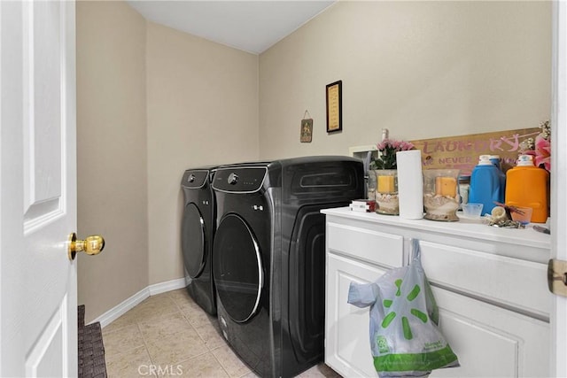 9153 Ravenswood Ave, Hesperia, CA 92344 - laundry room featuring washer and dryer, laundry area, light tile patterned flooring, and baseboards