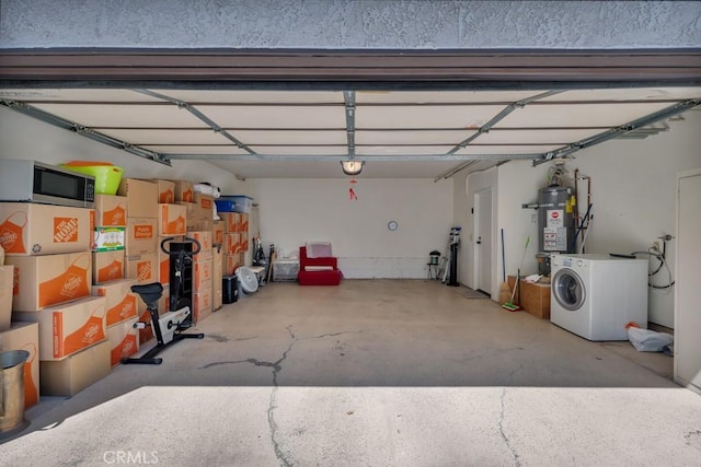 10480 Sunland Blvd Unit 16, Sunland, CA 91040 - garage featuring secured water heater and washer / dryer
