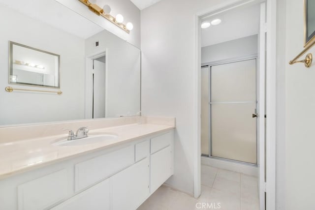 10480 Sunland Blvd Unit 16, Sunland, CA 91040 - full bathroom featuring a shower stall, tile patterned flooring, and vanity