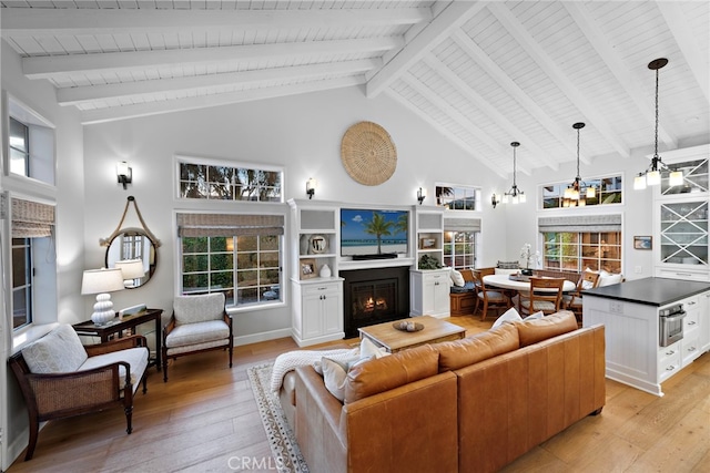 361 Cress St, Laguna Beach, CA 92651 - living room with a warm lit fireplace, light wood-style floors, wood ceiling, high vaulted ceiling, and beamed ceiling