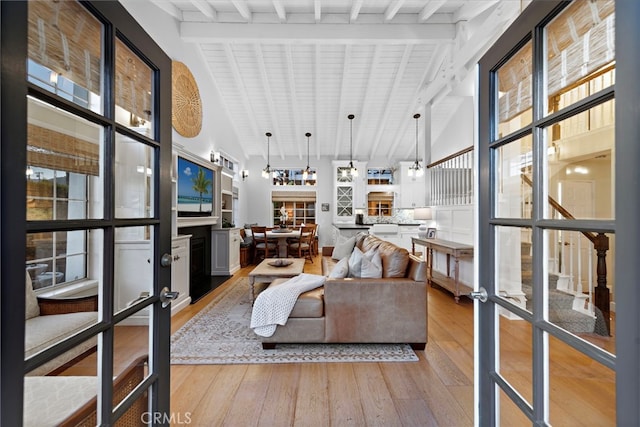 361 Cress St, Laguna Beach, CA 92651 - living area with light wood finished floors, beamed ceiling, and high vaulted ceiling