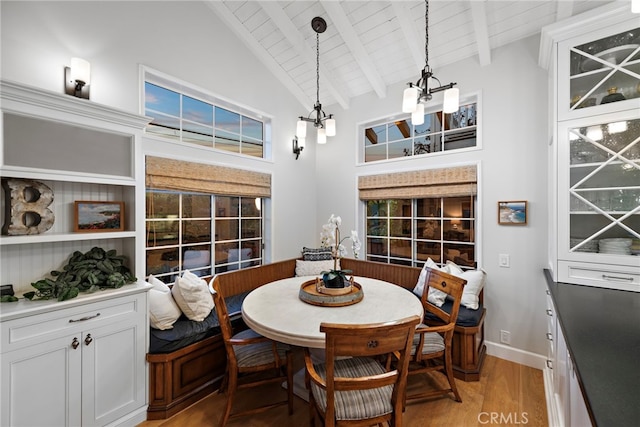 361 Cress St, Laguna Beach, CA 92651 - dining area with a chandelier, wood ceiling, light wood-type flooring, breakfast area, and beamed ceiling