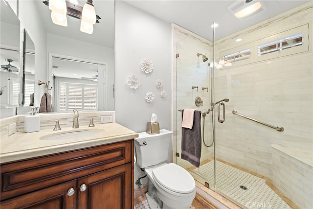 361 Cress St, Laguna Beach, CA 92651 - bathroom with a shower stall, a ceiling fan, toilet, and vanity