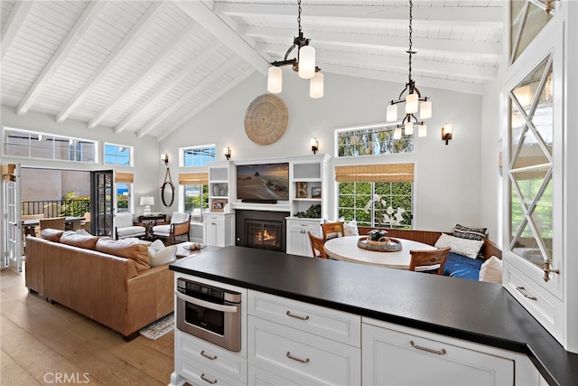 361 Cress St, Laguna Beach, CA 92651 - kitchen featuring light wood-style floors, dark countertops, high vaulted ceiling, wood ceiling, and beamed ceiling