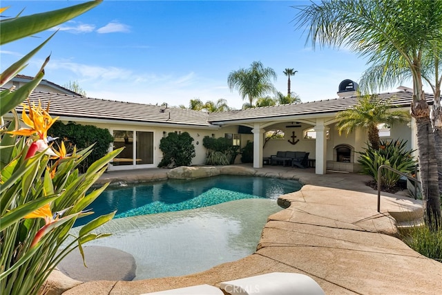 22883 Calcutta Dr, Canyon Lake, CA 92587 - outdoor pool featuring ceiling fan, a patio, and an outdoor living space