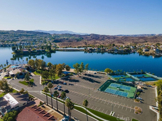 bird's eye view with a water and mountain view