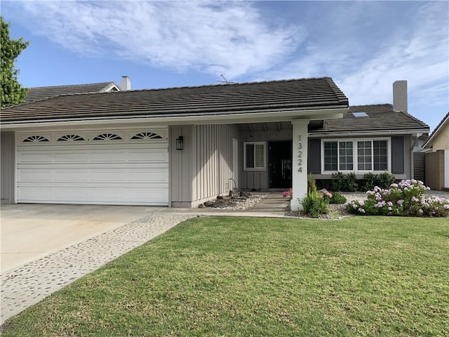 ranch-style house with a front lawn, board and batten siding, an attached garage, driveway, and a tile roof