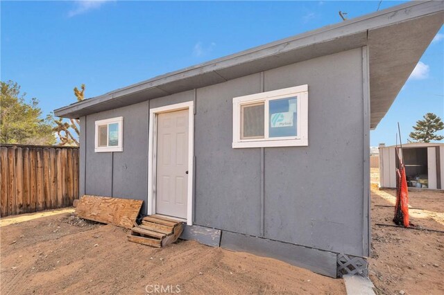 13206 Winona Rd, Apple Valley, CA 92308 - view of outdoor structure with fence and an outdoor structure