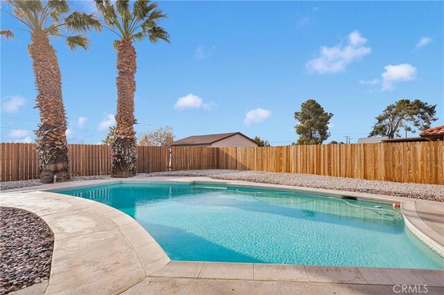 13206 Winona Rd, Apple Valley, CA 92308 - view of swimming pool featuring a fenced in pool and a fenced backyard