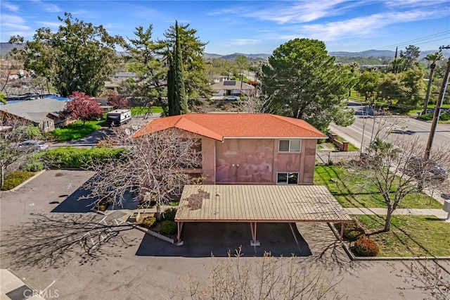 drone / aerial view featuring a mountain view