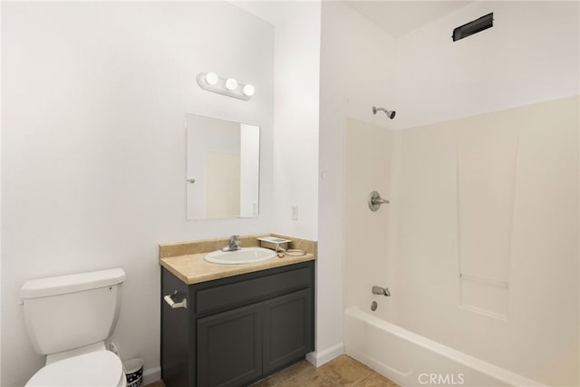 full bath with bathing tub / shower combination, tile patterned floors, vanity, and toilet