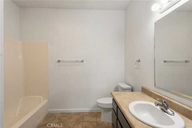 full bath featuring tile patterned floors, toilet, vanity, and baseboards