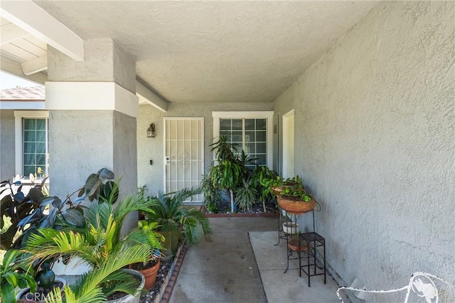 860 3rd St, Rialto, CA 92376 - doorway to property with stucco siding