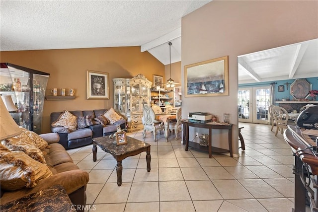 living area with light tile patterned floors, a textured ceiling, and french doors