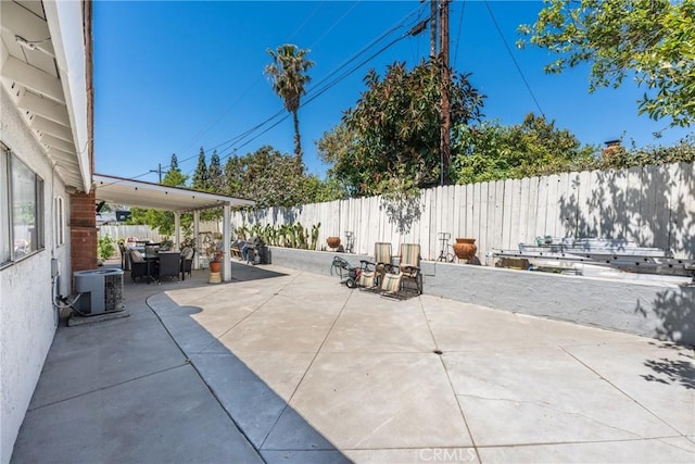 860 3rd St, Rialto, CA 92376 - fenced backyard with outdoor dining space and a patio