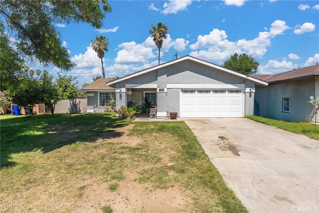 860 3rd St, Rialto, CA 92376 - ranch-style house featuring an attached garage, driveway, and stucco siding