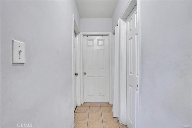 13031305 E Kingsley Ave, Pomona, CA 91767 - hallway with light tile patterned flooring