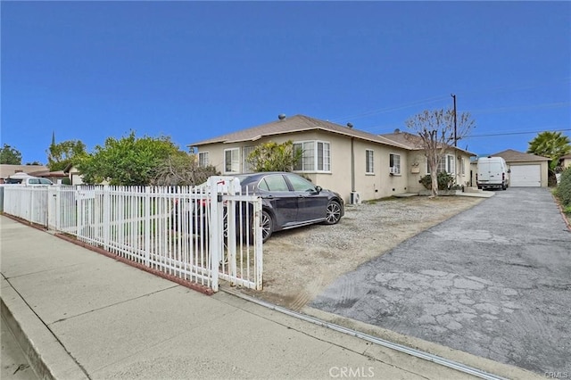 13031305 E Kingsley Ave, Pomona, CA 91767 - ranch-style home with stucco siding, an outdoor structure, and fence