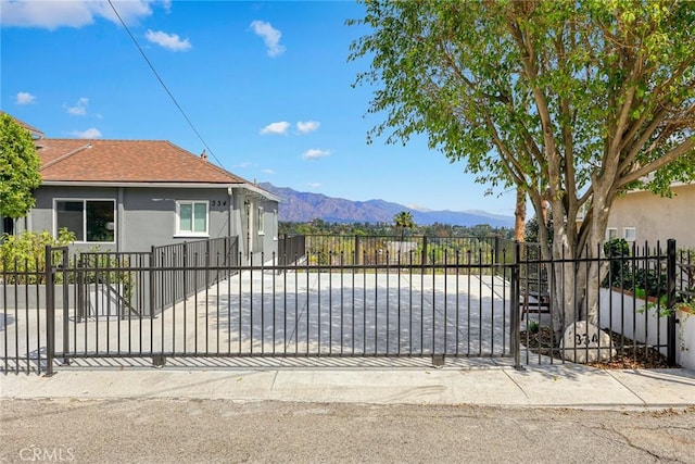 334 Anita Dr, Pasadena, CA 91105 - gate featuring a mountain view and fence