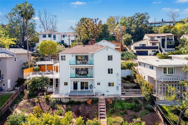 334 Anita Dr, Pasadena, CA 91105 - view of building exterior featuring stairway, fence, and a residential view
